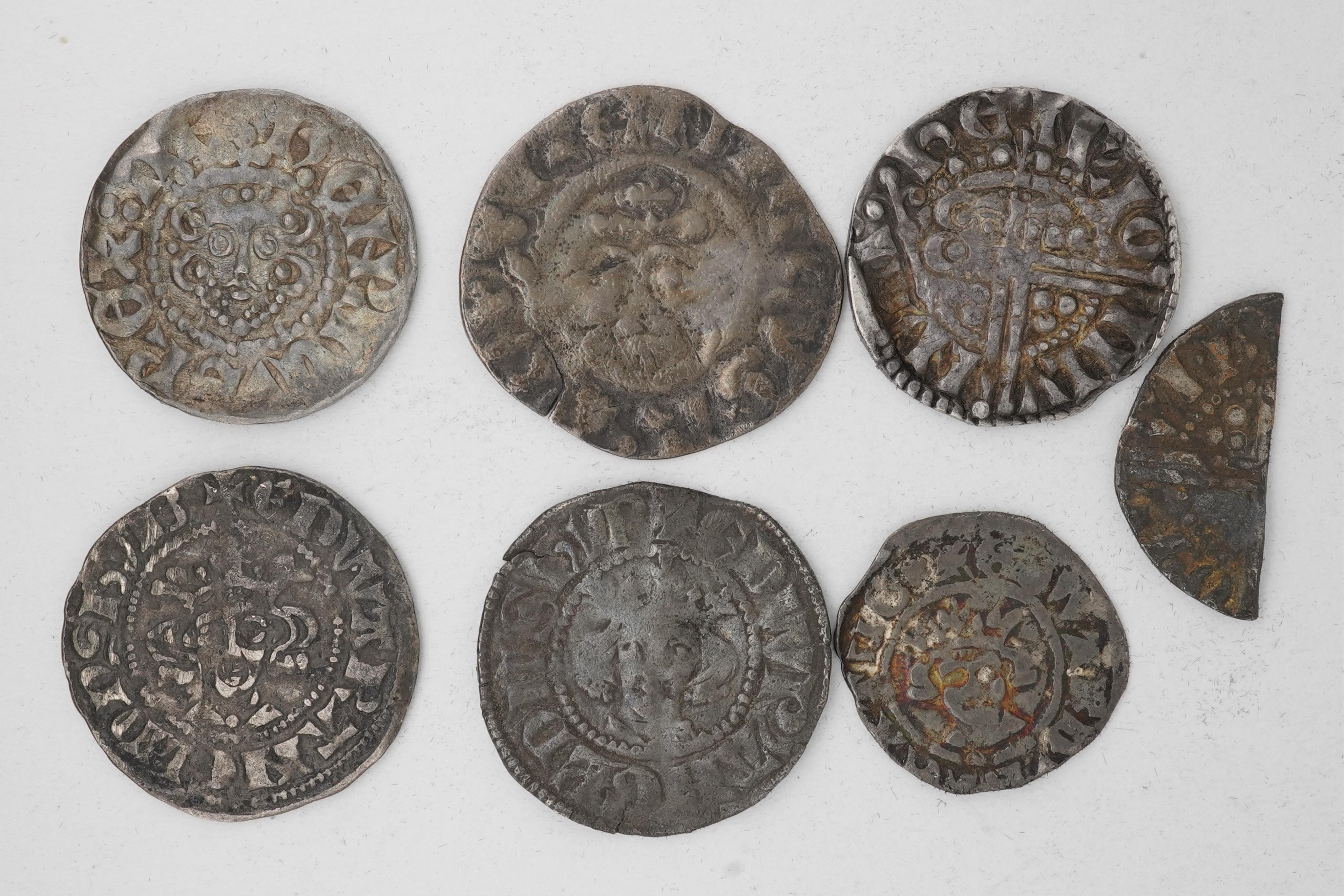 Seven British hammered silver coins, Plantagenet kings;, Henry III (1216-1272), long cross penny, a short cross penny, a double struck long cross penny, scarce, a cut halfpenny, Edward I (1272-1307), silver long cross pe